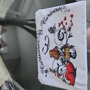NWOT Curiouser Alice in Wonderland Theme pouch